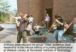 Anthony Bruscato and his group “Tribe” evidence Deaf leadership in the natural setting of a poetry performance at Wallace Library at Rochester Institute of Technology. 